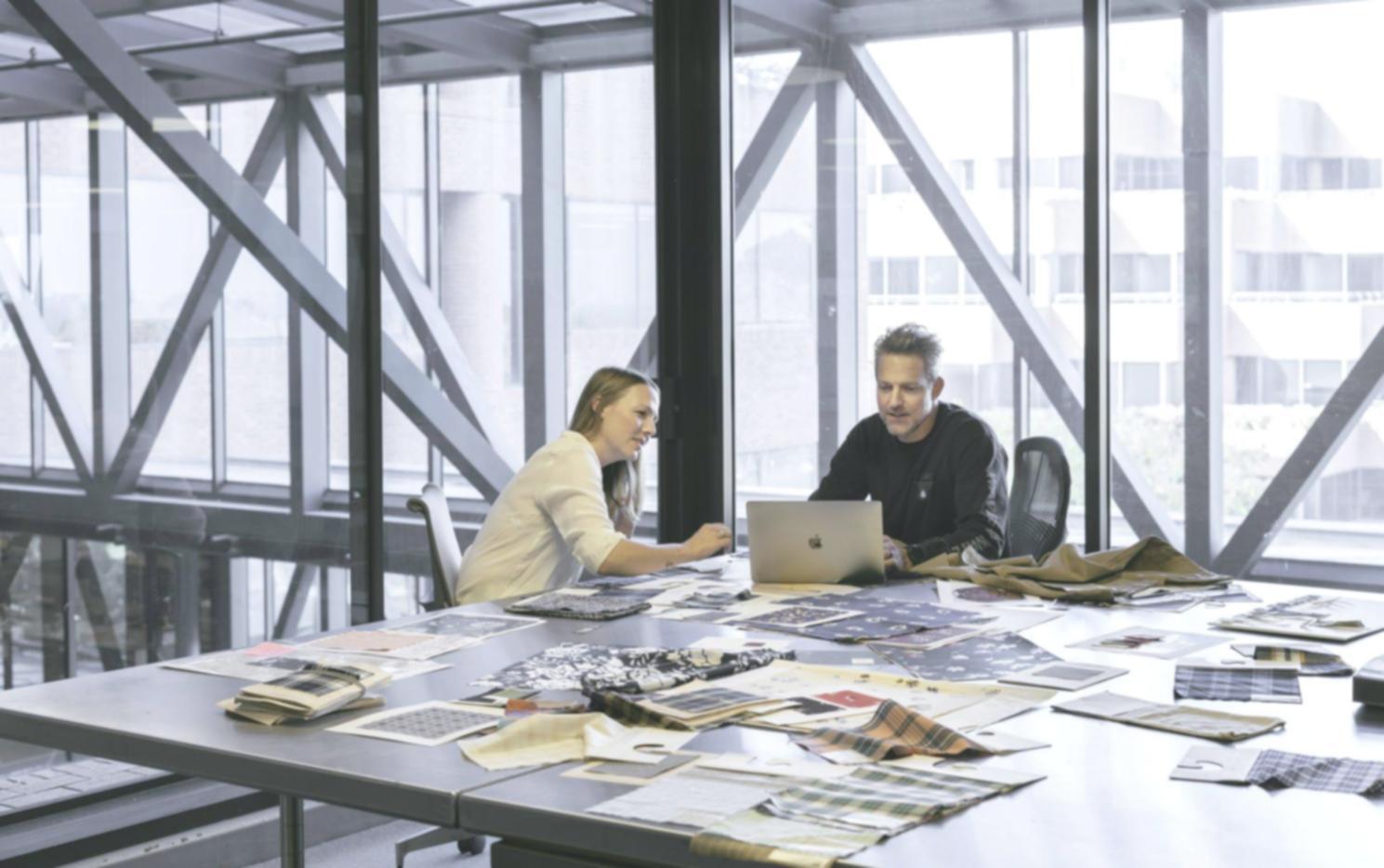 Financial analysis workspace with documents and charts